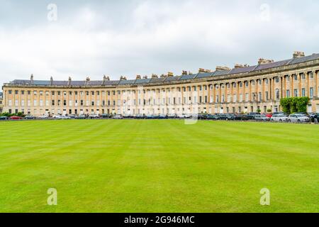 BATH, UK - JUNE 27, 2021: View of Royal Crescent in Bath, overlooking Royal Victoria Park Stock Photo