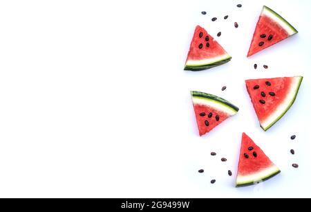 Five pieces of water melon with seeds against white background Stock Photo