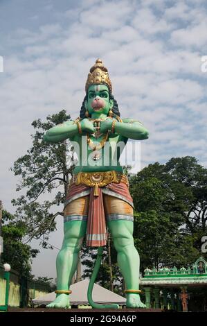 the large monkey god, hunaman, statue standing near the entrance to the batu caves in Gombak, selangor, malaysia on a sunny day. Stock Photo