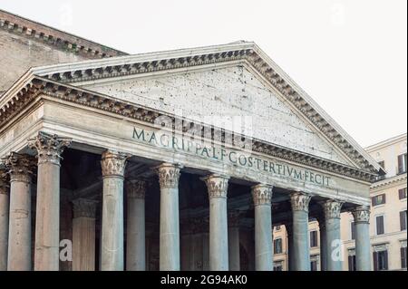 Details of a pediment and large granite Corinthian columns of the Pantheon, ancient Roman temple and Catholic church in Rome, Italy Stock Photo