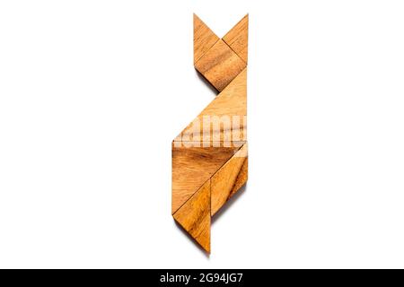 Wood tangram puzzle in cat sitting shape on white background Stock Photo