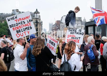 Trafalgar Square, London, UK. 24th July 2021.  Protest against vaccine passports in Trafalgar Square. Credit: Matthew Chattle/Alamy Live News Stock Photo
