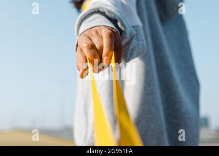 Pull on the leash of the relationship. Be an abuser. An unbreakable bond. Stock Photo