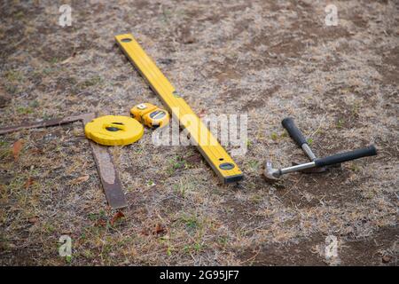 hand tools for laying out the shape of the building Stock Photo
