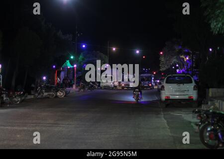 July 23, 2021: The pictures show a group of Syrian youths sitting on the top of Jabal Al-Arbaeen overlooking the city of Idlib and its countryside, where the mountain was a tourist destination before the Syrian revolution because of its beautiful and strategic location, after which it was subjected to intense bombardment by the regime forces, which led to the destruction of many buildings in it. Despite that, young people still go to spend Some time there despite the danger of bombing (Credit Image: © Moawia Atrash/ZUMA Press Wire) Stock Photo