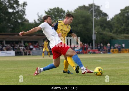 Callum Reynolds of Dagenham and Charlie Stimson of Hornchurch during Hornchurch vs Dagenham & Redbridge, Friendly Match Football at Hornchurch Stadium Stock Photo