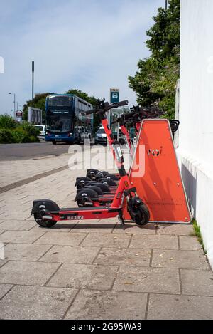 Voi E-scooters rental scheme on trial in Southampton city centre to bring a green environmental  non-emission way of people to travel around the city. Stock Photo