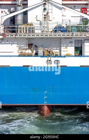 wake behind a general cargo ship Stock Photo