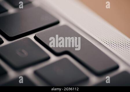 Izmir, Turkey - May 29, 2021: Close up shot of Enter button of an apple brand macbook. Stock Photo