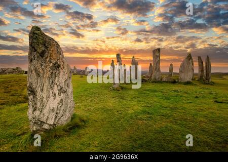 Stunning sunset over the stone circle at Callanish on the Isle of Lewis, Outer Hebrides of Scotland Stock Photo