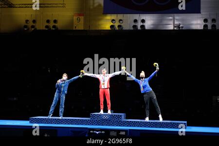 Award ceremony epee individual women, from left: Ana Maria POPESCU (ROU), 2nd place, silver medal, silver medal, silver medalist, silver medalist, SUN Yiwen (CHN), winner, Olympic champion, 1st place, gold medal, gold medalist, Olympic champion, gold medalist, Katrina LEHIS (EST), 3rd place, bronze medal, bronze medal, bronze medalist, bronze medalist, jubilation, cheering, joy, cheers, fencing, women's single epee, women's epee individual on 07/24/2021 Summer Olympics 2020, from 23.07. - 08.08.2021 in Tokyo/Japan. Stock Photo