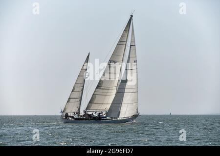Stormvogel a superb large wooden  racing and charter yacht enjoying a balmy day's racing at the Cowes Classic Regatta Stock Photo