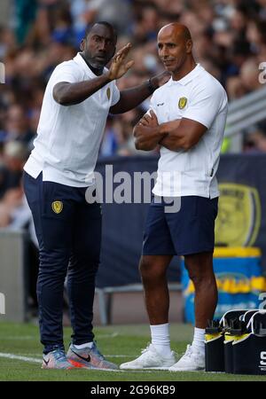 Burton upon Trent, England, 24th July 2021.  Jimmy Floyd Hasselbaink manager of Burton Albion and his assistant Dino Maamria during the Pre Season Friendly match at the Pirelli Stadium, Burton upon Trent. Picture credit should read: Darren Staples / Sportimage Stock Photo