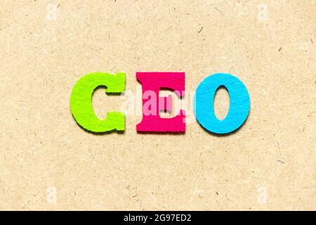Color cloth alphabet letter in word CEO (Abbreviation of Chief Executive Officer) on wood background Stock Photo