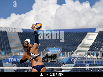 Tokyo, Japan. 25th July, 2021. April Ross of the United States serves during the beach volleyball women's preliminary match between Xue Chen/Wang Xinxin of China and April Ross/Alix Klineman of the United States at the Tokyo 2020 Olympic Games in Tokyo, Japan, July 25, 2021. Credit: Li He/Xinhua/Alamy Live News Stock Photo