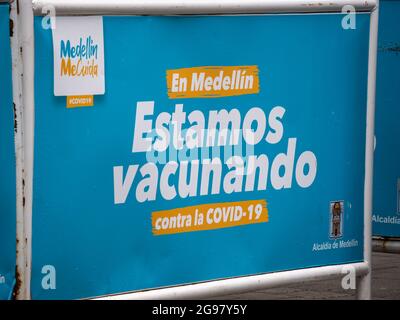 Medellin, Colombia - July 21 2021: Banner that Reads: 'In Medellin, We're Vaccinating Against COVID-19' Stock Photo