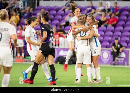 Orlando, United States. 25th July, 2021. OL Reign players celebrate after Tziarra King (23 OL Reign) scored the second goal for the team during the National Women's Soccer League game between Orlando Pride and OL Reign at Exploria Stadium in Orlando, Florida. NO COMMERCIAL USAGE. Credit: SPP Sport Press Photo. /Alamy Live News Stock Photo