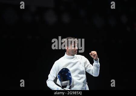 Tokyo. 25th July, 2021. Georgely Siklosi of Hungary celebrates victory after winning the men's Epee Individual Table of 32 against Dong Chao of China at Tokyo 2020 Olympic Games in Tokyo, July 25, 2021. Credit: Zhang Hongxiang/Xinhua/Alamy Live News Stock Photo