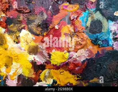 Palette with oil paints - abstract colored background Stock Photo