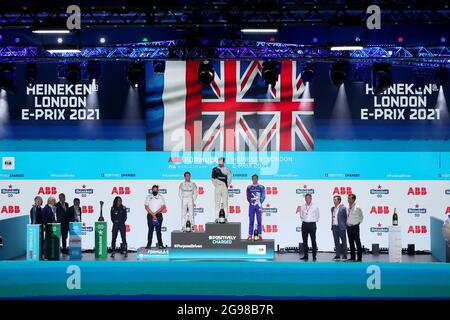 Excel Circuit, Docklands, London, UK. 24th July, 2021. Formula E London E Prix; The podium winners observe their national anthems from Race 1 Credit: Action Plus Sports/Alamy Live News Stock Photo