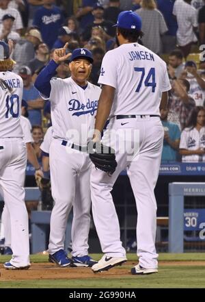 Los Angeles, United States. 25th July, 2021. Los Angeles Dodgers' closing pitcher Kenley Jansen (74) is greeted by manager Dave Roberts after the Dodgers beat the Colorado Rockies 1-0 at Dodger Stadium in Los Angeles on Saturday, July 24, 2021. Photo by Jim Ruymen/UPI Credit: UPI/Alamy Live News Stock Photo