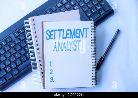 Text caption presenting Settlement Analyst. Business showcase Negotiate settlement using the most effective means Two Plain Lined Spiral Notebooks Stock Photo