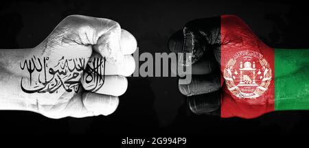 Taliban Vs Afghanistan Flags Painted on Hands Facing Each Other. Conflict Between Two nations concept backdrop Stock Photo