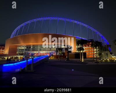 Doha, Qatar – September 29, 2019: Colorful illuminated Khalifa International Stadium in Doha at night, Qatar, Middle East Stock Photo