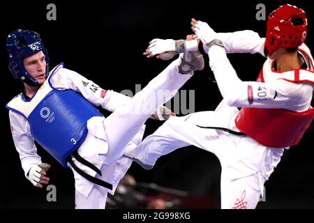 Great Britain's Bradly Sinden (right) in action against China's Shuai Zhao in the Men 68kg Semifinal match at Makuhari Messe Hall A on the second day of the Tokyo 2020 Olympic Games in Japan. Picture date: Sunday July 25, 2021.
