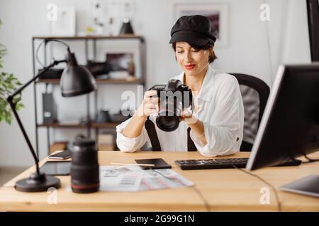 Photographer working at office Stock Photo