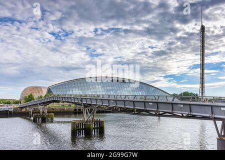 The Millenium Bridge over the River Clyde with the Glasgow Science Centre in the background. Stock Photo