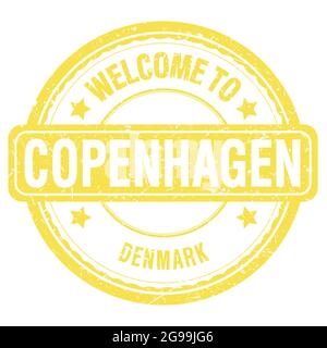 WELCOME TO COPENHAGEN - DENMARK, words written on yellow grungy stamp Stock Photo