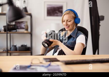Photographer working at office Stock Photo