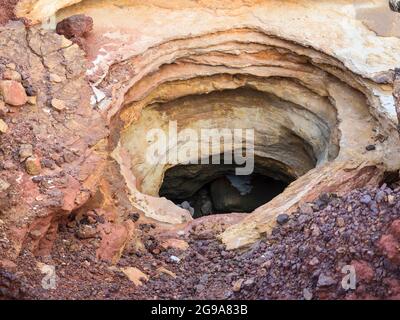 Sandstone rock hole created by erosion, Reddell Beach, Broome, Kimberley, Western Australia Stock Photo