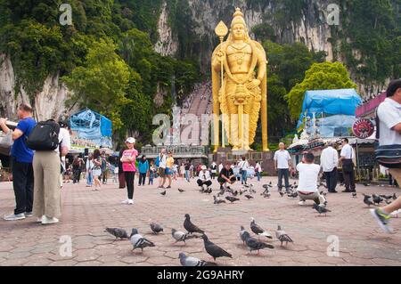 August 21, 2017. Gombak, Malaysia. People taking pictures in front of the landmark lord murugan statue, hindu deity, within the batu caves scenic area Stock Photo