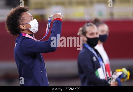 Silver medalist Amandine Buchard from France holds her medal on the podium after the Women's Judo 52kg competition at the Tokyo Summer Olympics in Tokyo, Japan on Sunday, July 25, 2021.   Photo by Bob Strong/UPI.. Stock Photo