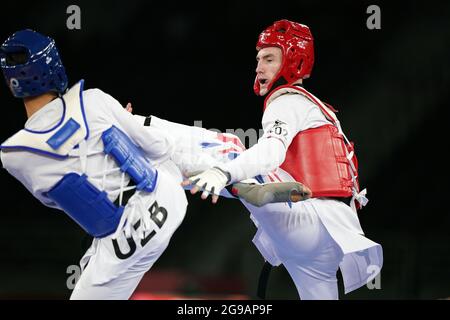 Great Britain's Bradly Sinden (right) in action against Uzbekistan's Ulugbek Rashitov in the Men's 68kg Gold Medal Contest at Makuhari Messe Hall A on the second day of the Tokyo 2020 Olympic Games in Japan. Picture date: Sunday July 25, 2021.