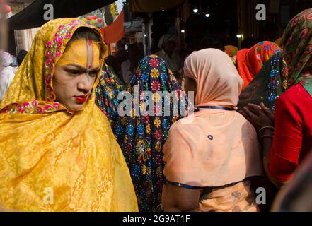 A devotee in a lane of Mathura, on the day of Holi festival. Stock Photo