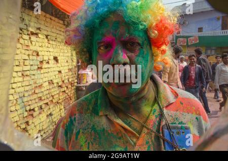 A colorful portrait of a devotee in a lane of Mathura in India. Stock Photo