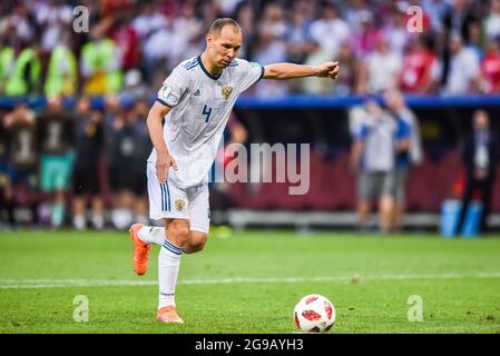 Moscow, Russia - July 1, 2018. Russia national football team defender Sergei Ignashevich performing a penalty kick during penalty shootout in FIFA Wor Stock Photo