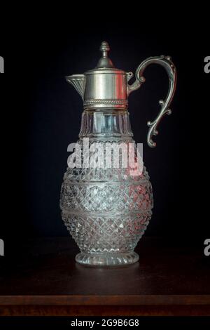 Sculpted Crystal Jar with Silver Cover Stock Photo