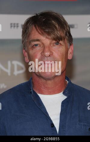 Munich, Germany. 25th July, 2021. The actor Andre Eisermann comes to the premiere of his feature film 'Ostwind - Der große Orkan' at the Mathäser cinema. The theatrical release is on 29.07.2021. Credit: Ursula Düren/dpa/Alamy Live News Stock Photo