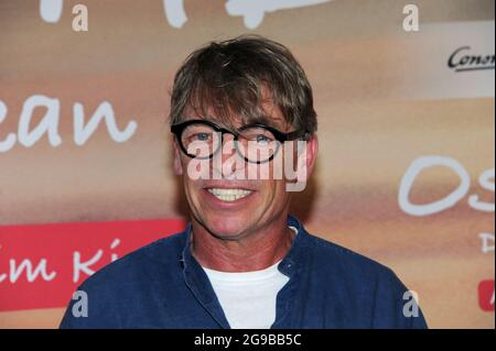 Munich, Germany. 25th July, 2021. The actor Andre Eisermann comes to the premiere of his feature film 'Ostwind - Der große Orkan' at the Mathäser cinema. The theatrical release is on 29.07.2021. Credit: Ursula Düren/dpa/Alamy Live News Stock Photo