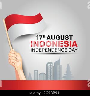 happy independence day Indonesia 17th august. hands holding with Indonesian flag. vector illustration design. Stock Vector