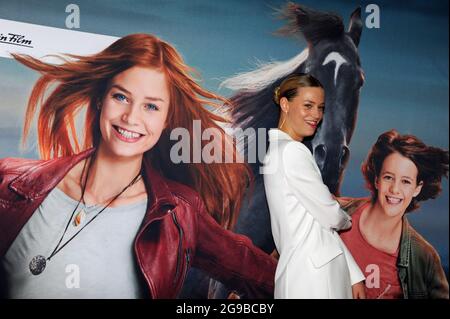 Munich, Germany. 25th July, 2021. The actress Hanna Binke comes to the premiere of her feature film 'Ostwind - Der große Orkan' at the Mathäser cinema. The theatrical release is on 29.07.2021. Credit: Ursula Düren/dpa/Alamy Live News Stock Photo