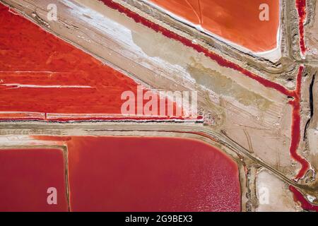 Aerial top down view of salt pans at Walvis Bay in Namibia, southwest Africa. Stock Photo