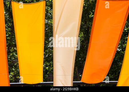 Red, orange and red color cloth in the park Stock Photo