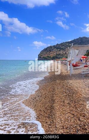 The most beautiful beaches of Puglia in Italy: Piana di Mattinata Beach is a typical pebble beach on the Gargano promontory. Stock Photo