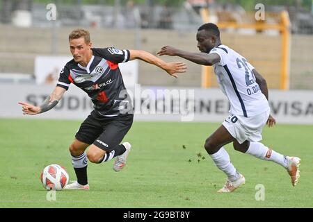 Lugano, Switzerland. 25th July, 2021. Mikael Facchinetti (#7 FC Lugano) and  Nikola Boranijasevic (#19 FC Zuerich) during the Super League match between FC  Lugano and FC Zuerich at Cornaredo Stadium in Lugano