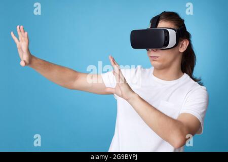 Young man using virtual reality headset. gadgets Stock Photo